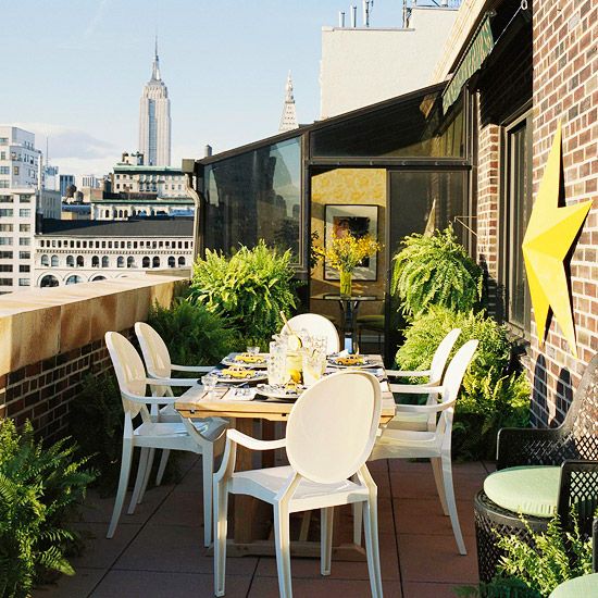ideias de design varanda e terraço na cobertura paredes de tijolos estrelas amarelas