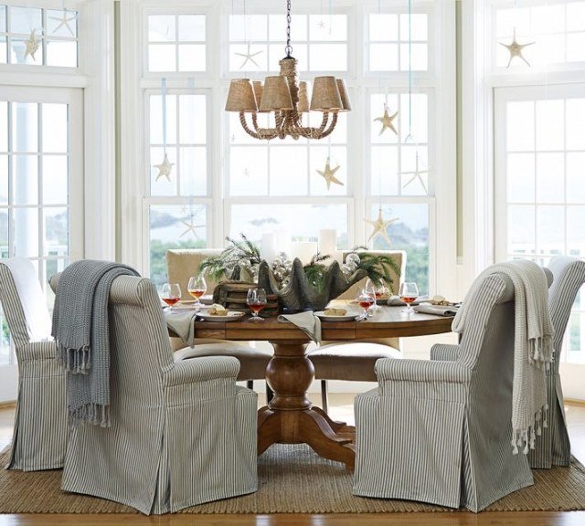 sala de jantar-madeira-janela-redonda-decoração-estrela do mar