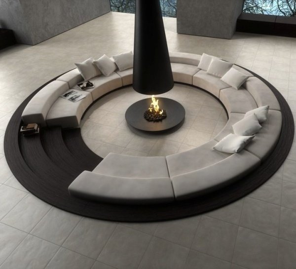 Conjunto de sofás redondos com lareira preta e branca design de sala de estar