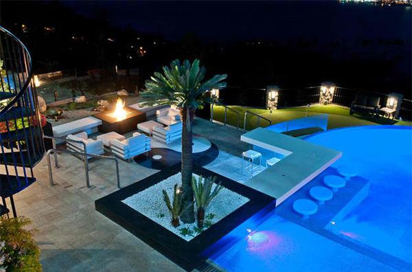 piscina terraço palmeiras área de estar ambiente lounge