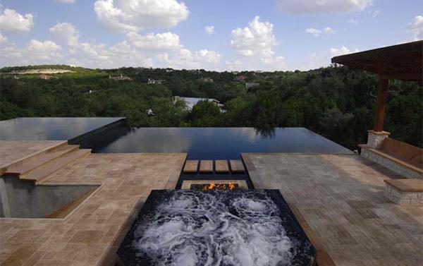 banheira de hidromassagem piscina infinita piso de ladrilhos de fogueira