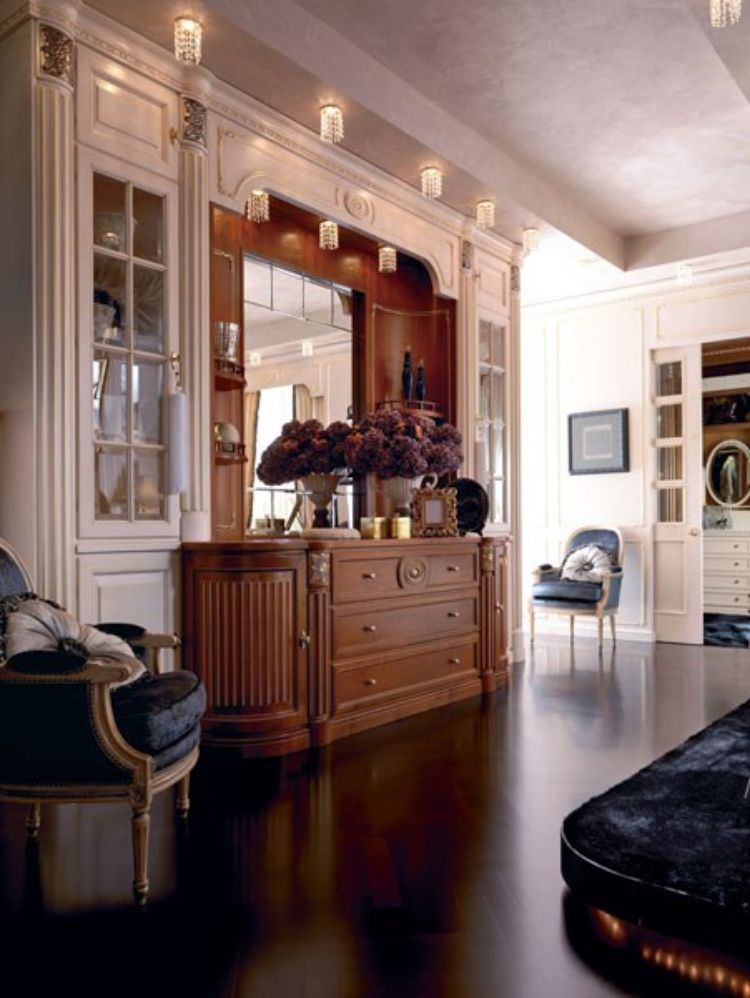 design-móveis-quarto-cômoda-madeira-espelho-piso-escuro-paredes bege