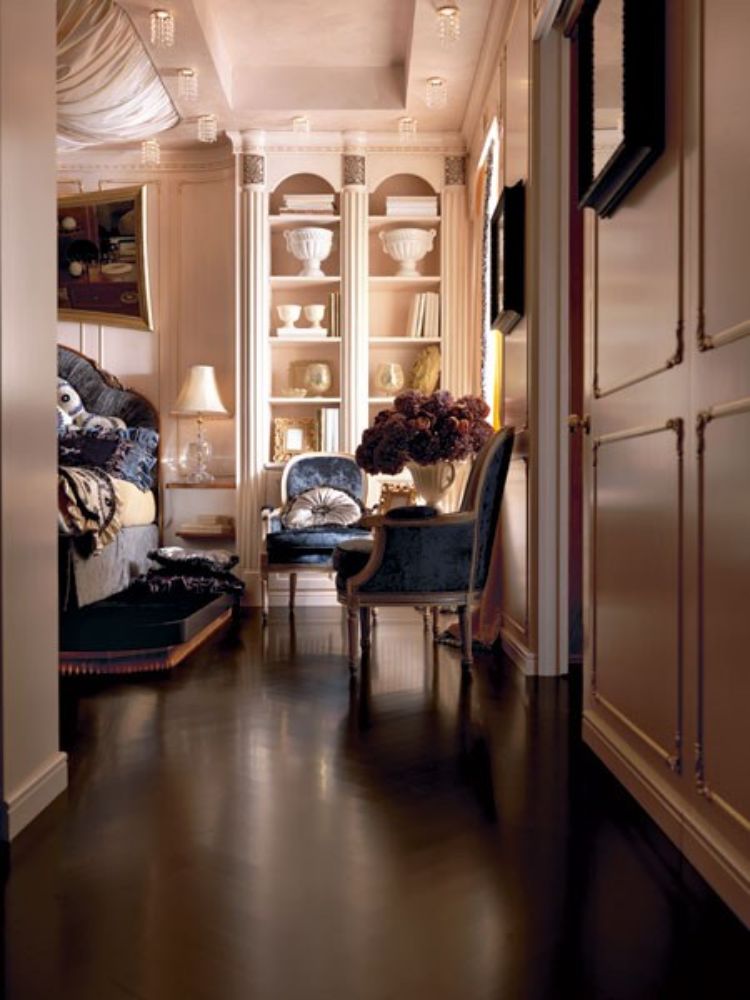 design-móveis-quarto-cama estofada-poltrona-preto-piso-bege-prateleiras de parede