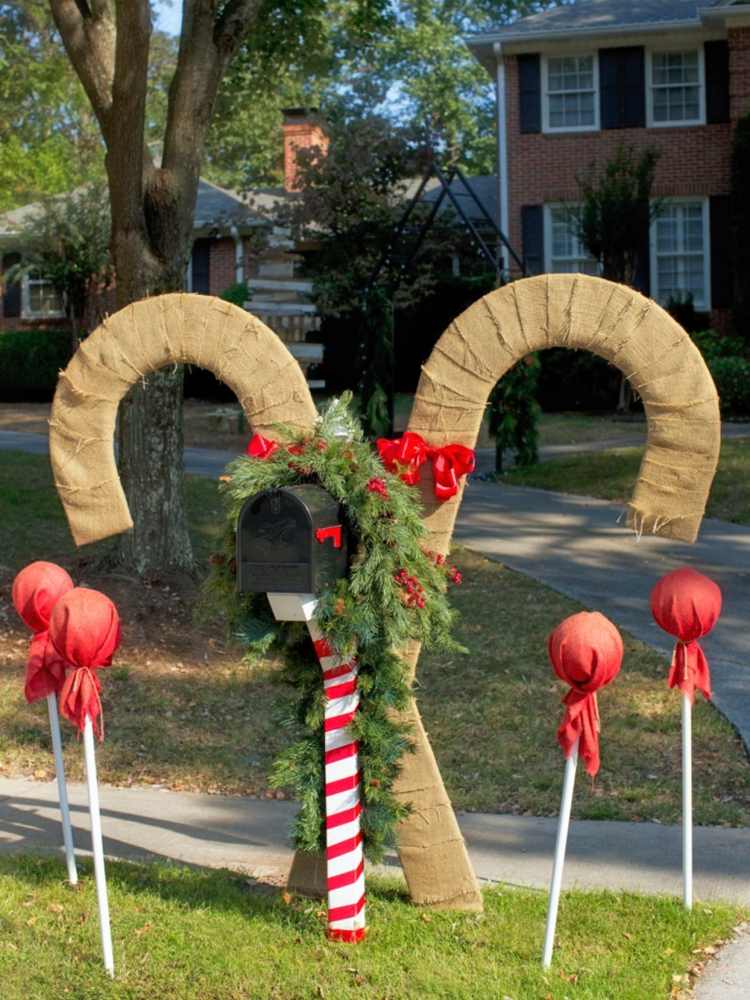 decorações de natal no jardim caixa de correio bastões de doces linho pirulito ramos de abeto