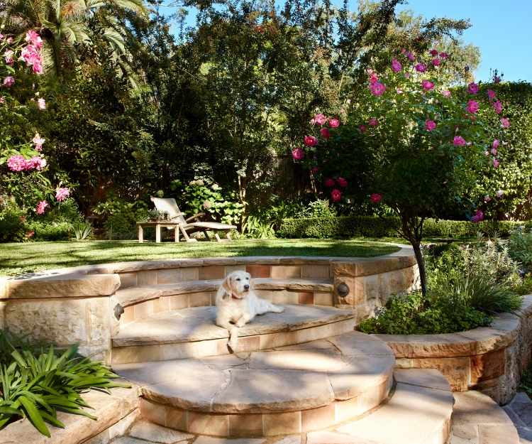garden-design-ideas-natural-stone-tiles-gramado-dog-trees