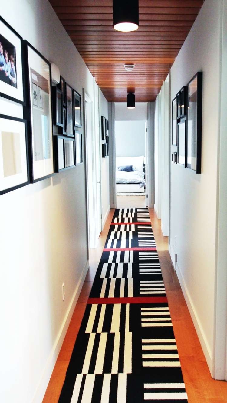 hall-decoration-ideas-black-picture-frames-black-white-carpet