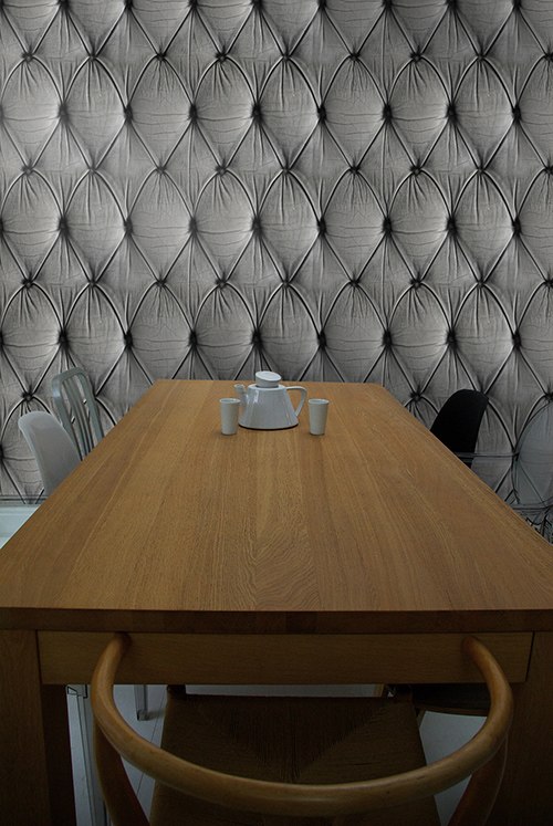 Parede estofada com ideias de decoração de escritório