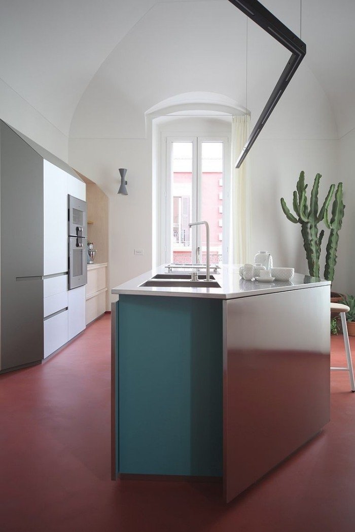 futuristic-kitchen-design-kitchen block-kitchen island-inox-optic-floor-linoleum-red
