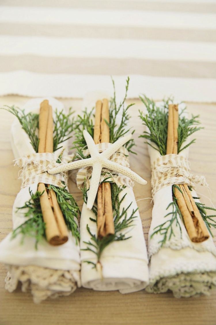 ideias decoração de natal praia estilo paus de canela anel de guardanapo perene
