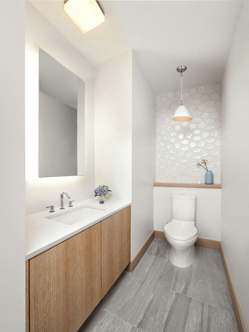 sotaque parede pedra ladrilhos geométricos projeto banheiro branco