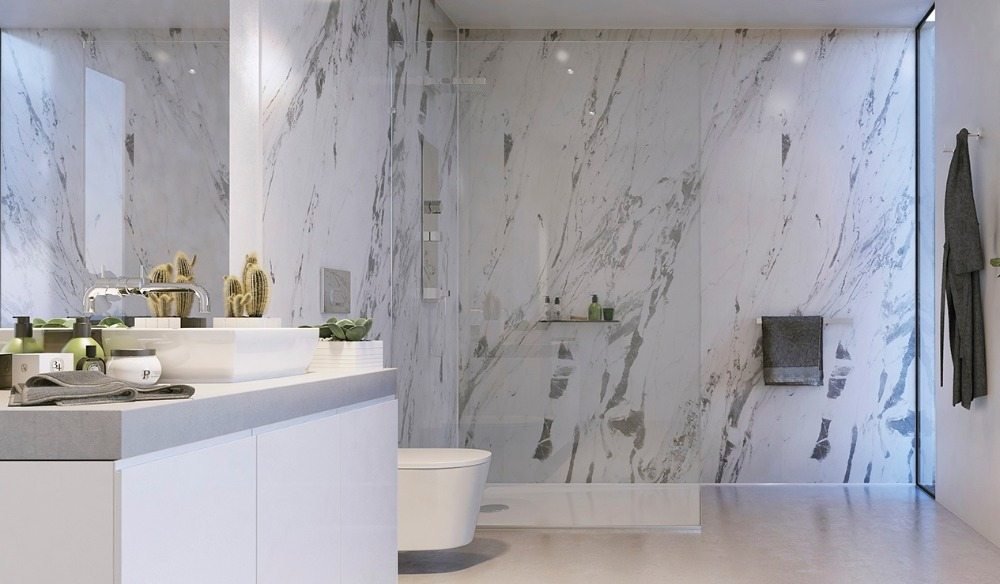 Use mármore branco como revestimento de parede e como alternativa aos azulejos no banheiro