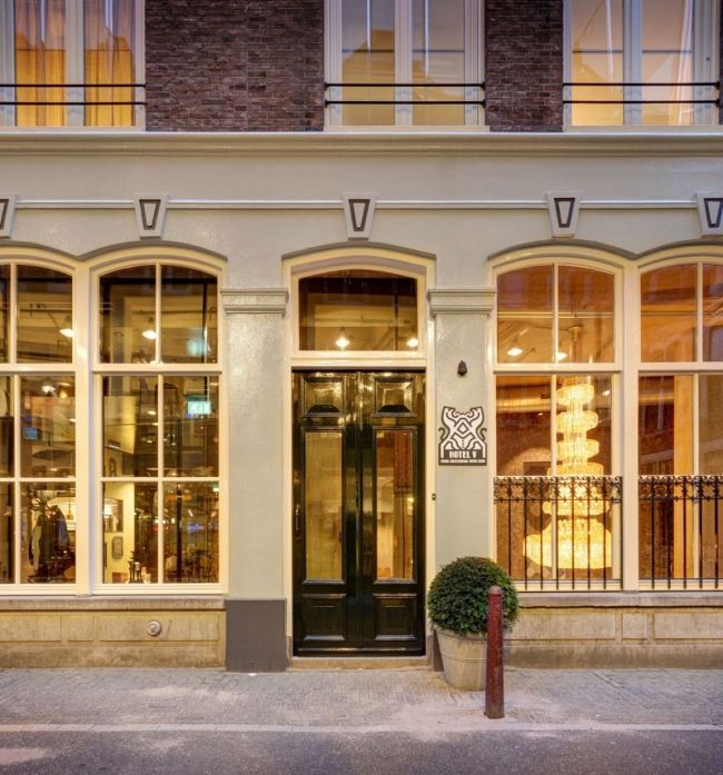 hotel de luxo de entrada na rua nesplein em amsterdã