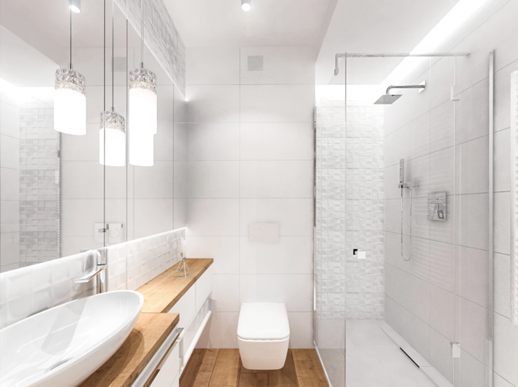 O banheiro é projetado em branco com azulejos em relevo e madeira como destaque