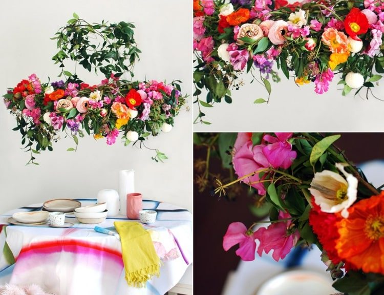 Guirlanda de flores para pendurar sobre a mesa com flores coloridas e gavinhas