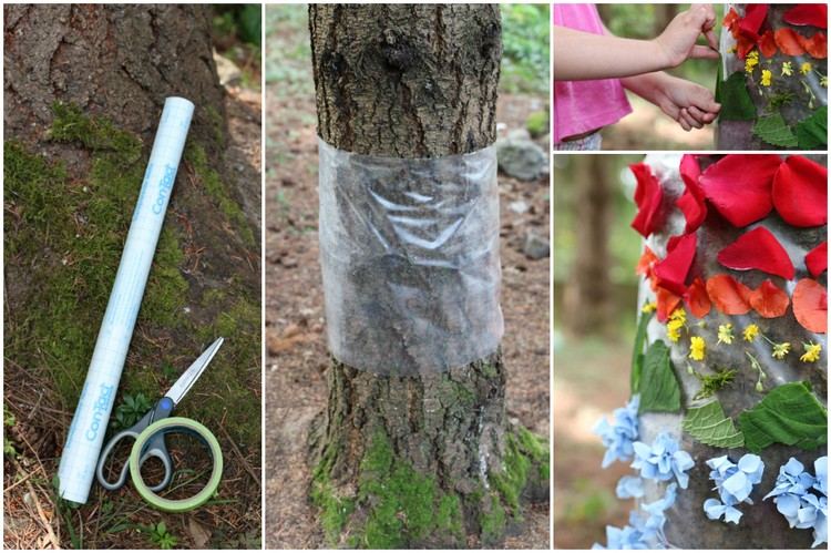 Artesanato com materiais naturais criam arco-íris na árvore na primavera