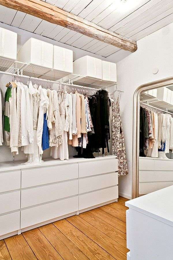walk-in-closet-wood-floor-white-drawer-clothes-rail