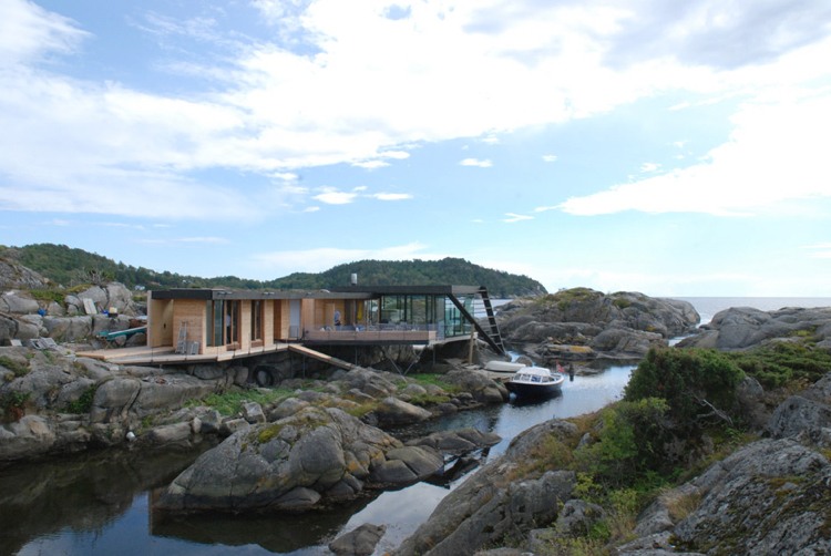 Bangalô de concreto -cottage-sea-rocks-coast-water-design