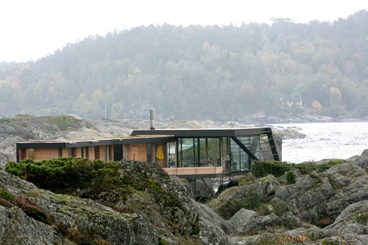 Bangalô de concreto-casa de férias-mar-rocha-costa-arquitetura moderna