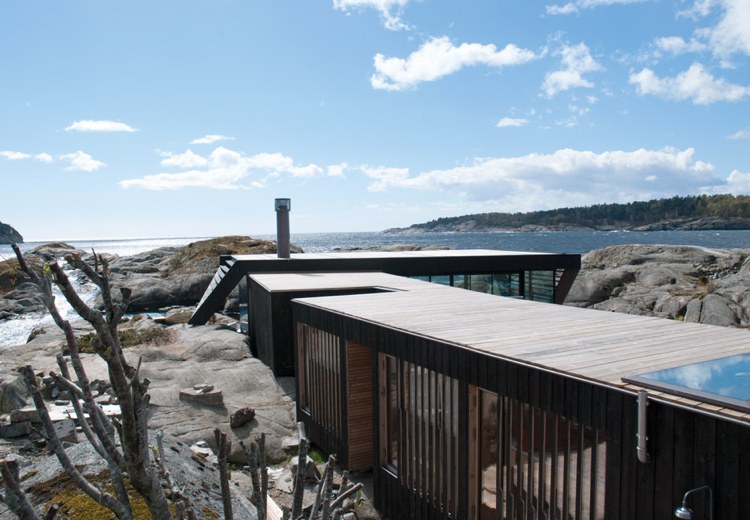 concreto-bangalô-férias-casa-mar-arquitetura moderna-rocha-água