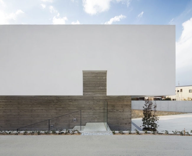Revestimento da parede externa - casa de concreto - telhado plano moderno
