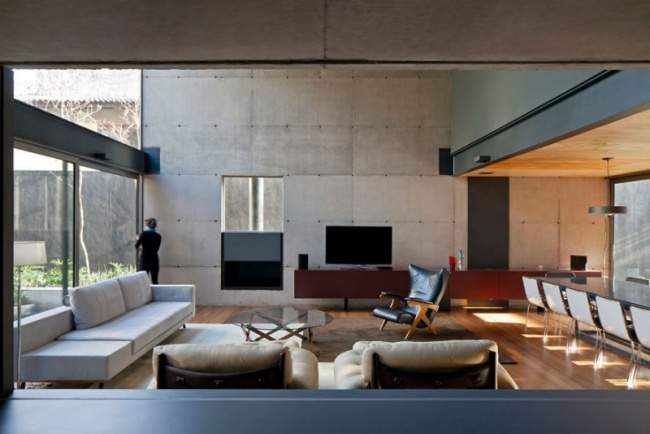 Parede de concreto envidraçada - design de interiores em estilo loft - terraço com área de jantar