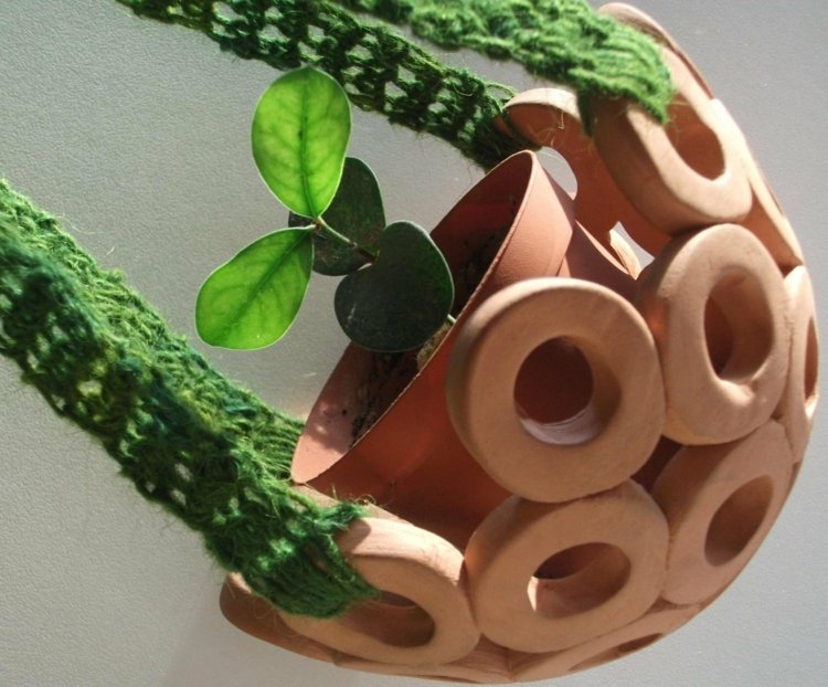 Projeto de vaso de flores feito à mão malha padrão de anéis retrô