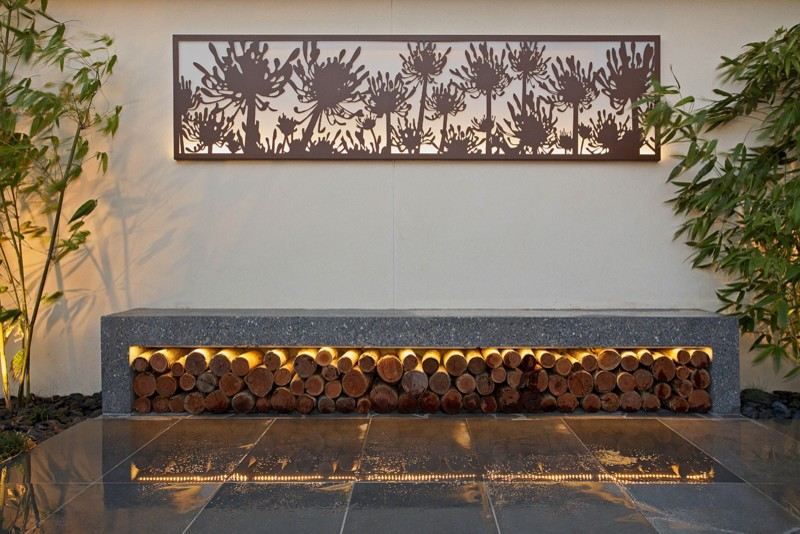 Lenha-loja-parede-decoração-fora-jardim banco de concreto