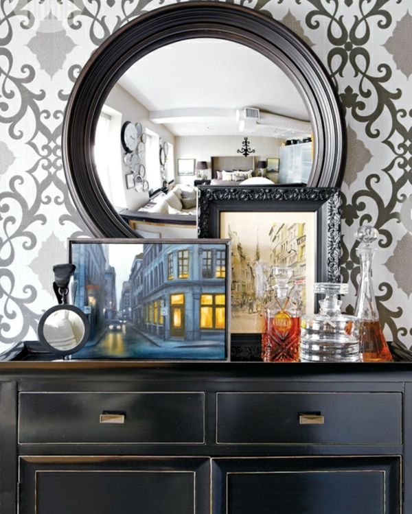 pequeno apartamento criado espelho de obras de arte