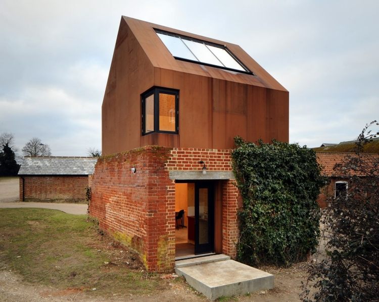 corten steel-cladding-additional-building-red-bricks