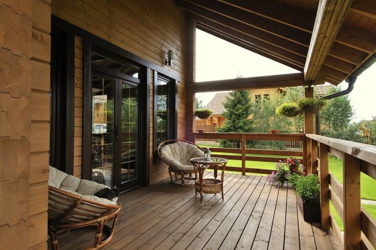 Veranda-design-tips-ideas-country-style-wood-poltrona-rattan-roofing-garden