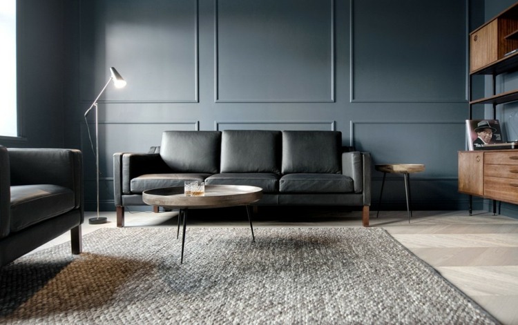 cores escuras texturas sala sofá mesa de centro tapete
