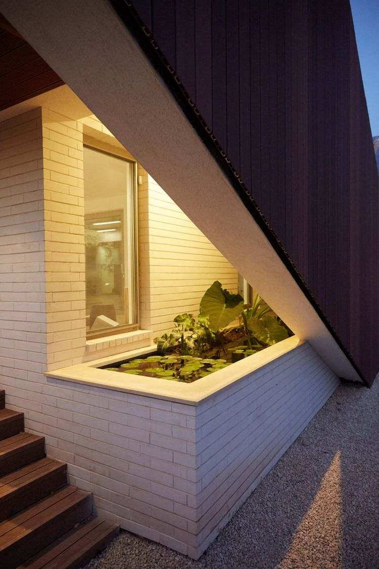 casa feita de material reciclado eco360 construção sustentável eficiência casa mais casa da energia mais casa da energia escada de tiras de madeira