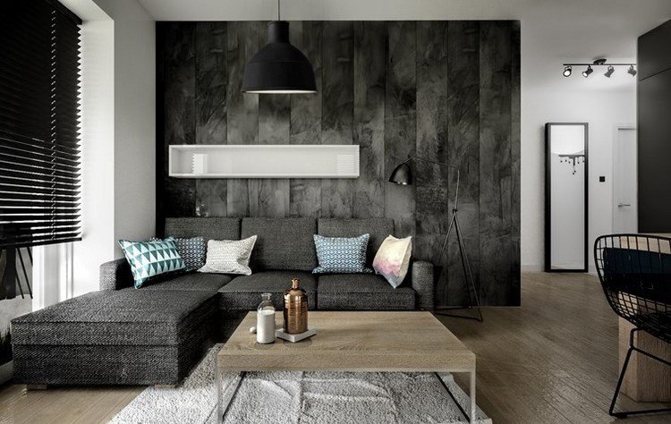Sofá de sala de estar moderno-antracite-madeira-mesa de centro-quadrado-colorido-travesseiros-piso de madeira