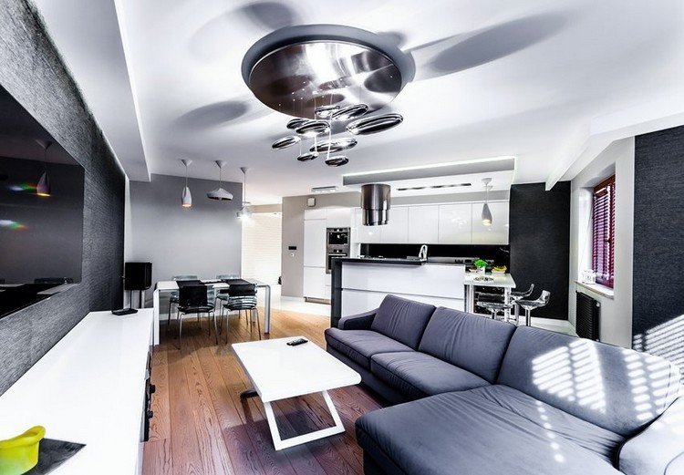 moderna-sala de estar-sofá-cinza-piso de madeira-branco-mesa de centro