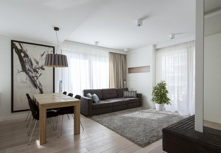 moderna-sala de estar-sofá-3-lugares-cinza-tapete desgrenhado-madeira-piso-mesa de jantar