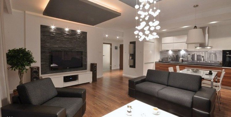sala de estar moderna-sofá-parede-parede-tv de tijolos voltada para a ardósia