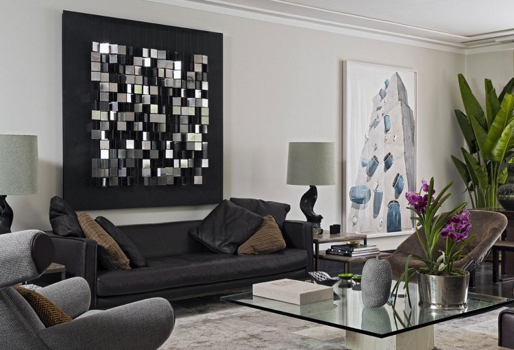 moderna-sala de estar-sofá-ideias-preto-obras de arte-carpete-plantas