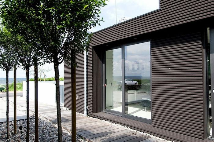 Caminho de jardim de madeira Casa unifamiliar moderna minimalista
