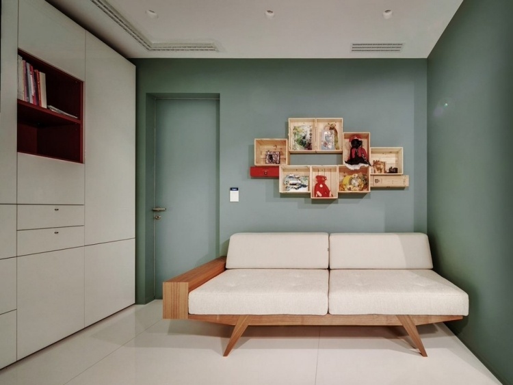 quarto de hóspedes-móveis-sofá-cama-moldura de madeira-sage green-wall paint
