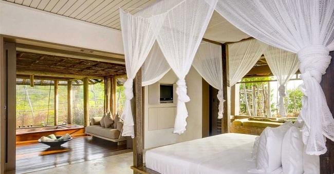 vilas de férias ilha caribenha cama com dossel arejado