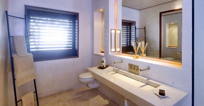 Opium Mustique villa de férias banheiro design pia de pedra