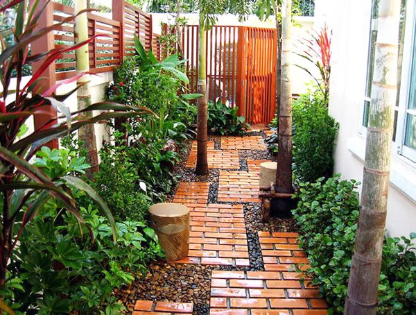 Projete seu próprio jardim de passarela de seixos de tijolos vermelhos