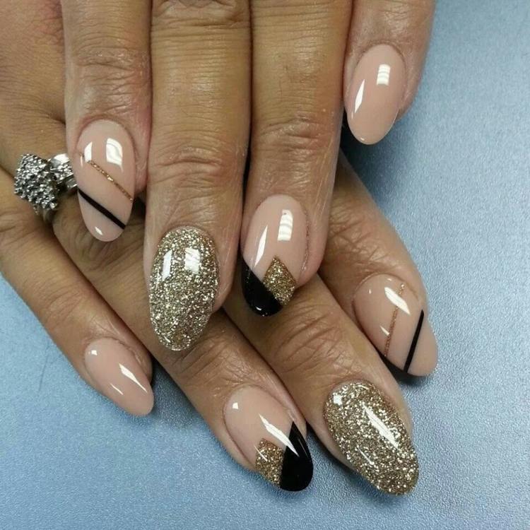 elegantes unhas de gel nageldesign ouro glitter nude preto