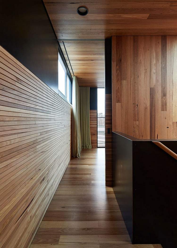 design preto-branco-segundo-andar-corrimão-tiras-revestimento-parede de madeira