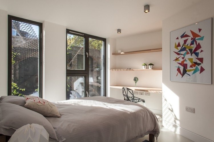 arquitetura-interior-projeto-interior-sustentável-quarto-janela-grande-luz do dia