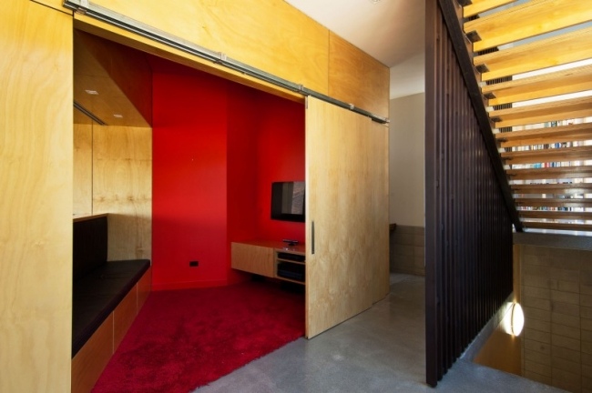 Casa de cinema com porta deslizante folheado de madeira Cedar Dublin Street House Nova Zelândia