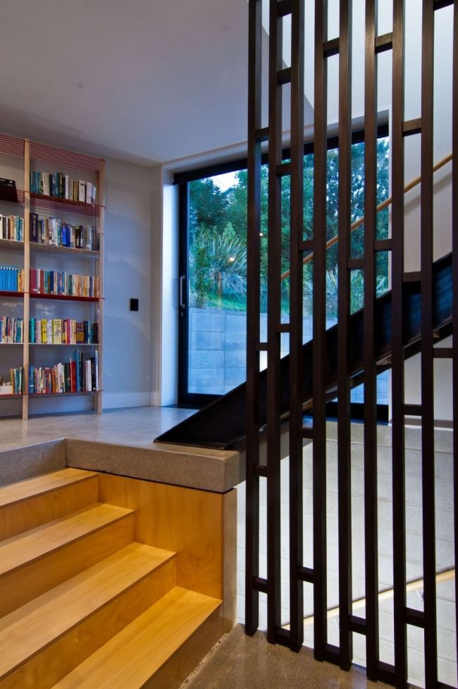 Mezanino-biblioteca-escadas de madeira com vidros-Nova Zelândia Dublin-Street-House