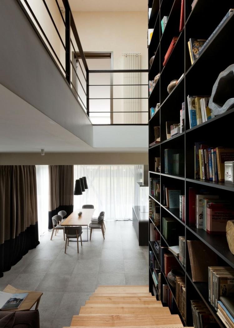 decoração da casa prateleira corrimão preto piso de pedra