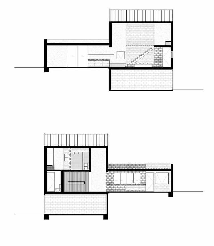 casa com paredes de concreto com design sustentável e formas minimalistas como uma planta baixa em dois níveis