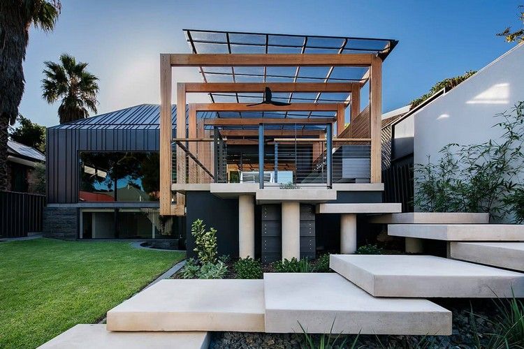 Extensão da casa com terraço em duas águas